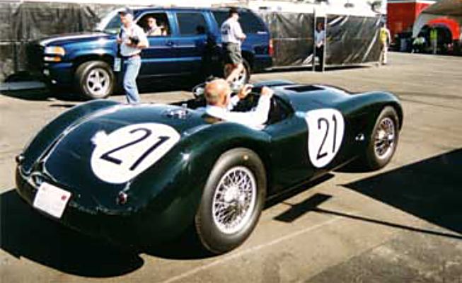 Stirling Moss in a Jaguar C-Type  